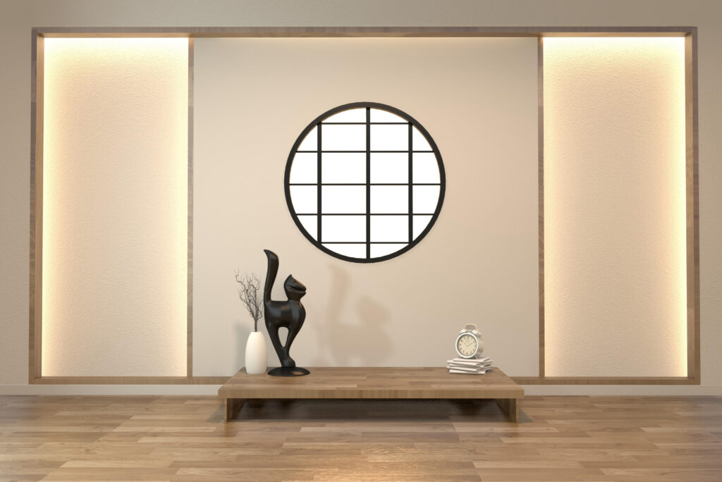 Modern minimalistic wall with round mirror and wall art installation, featuring sleek wooden bench and decor.